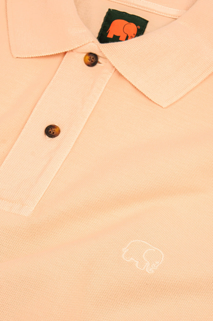 Polo pigmentata essenziale color crema al burro