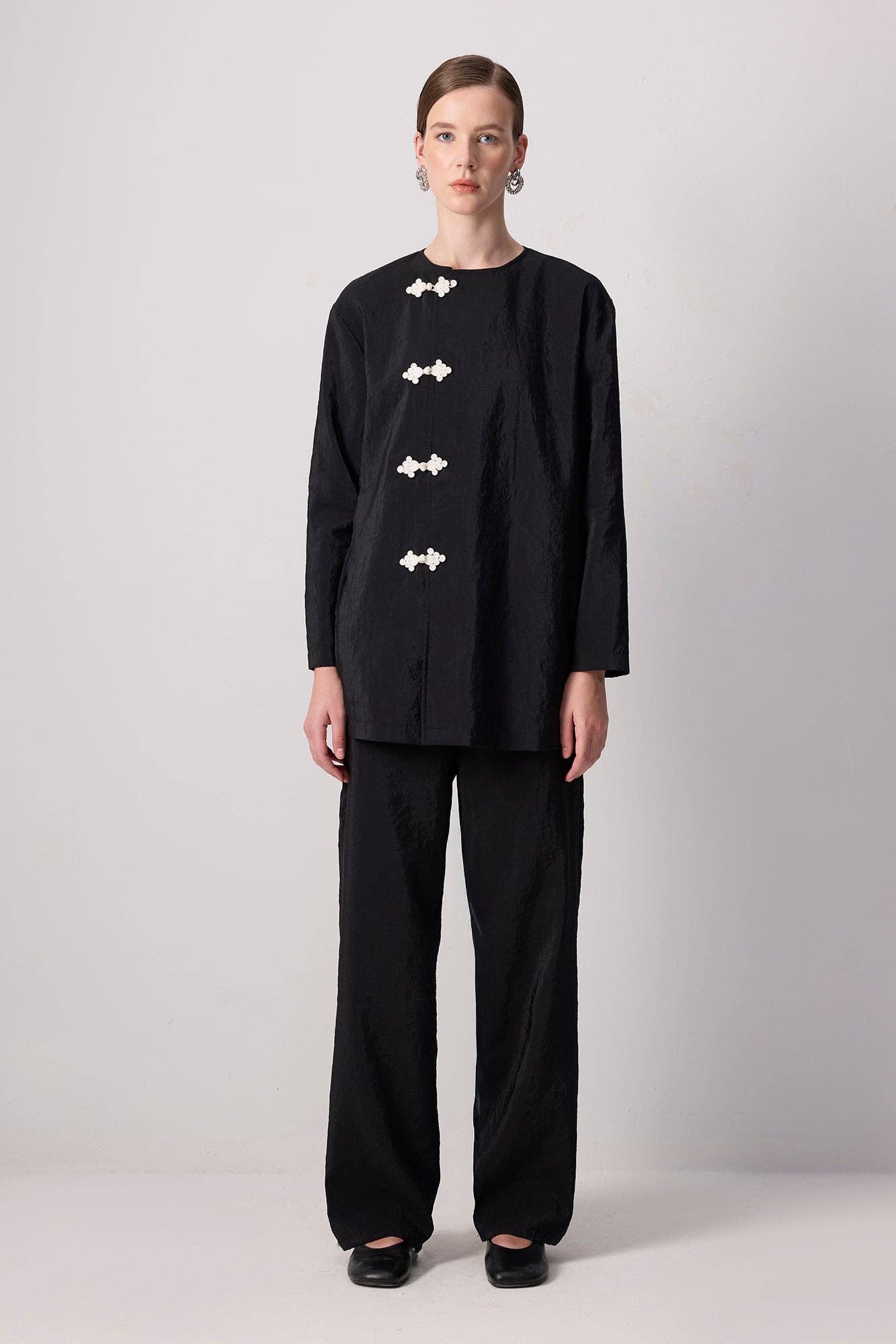 Set tunica e pantaloni in cupro