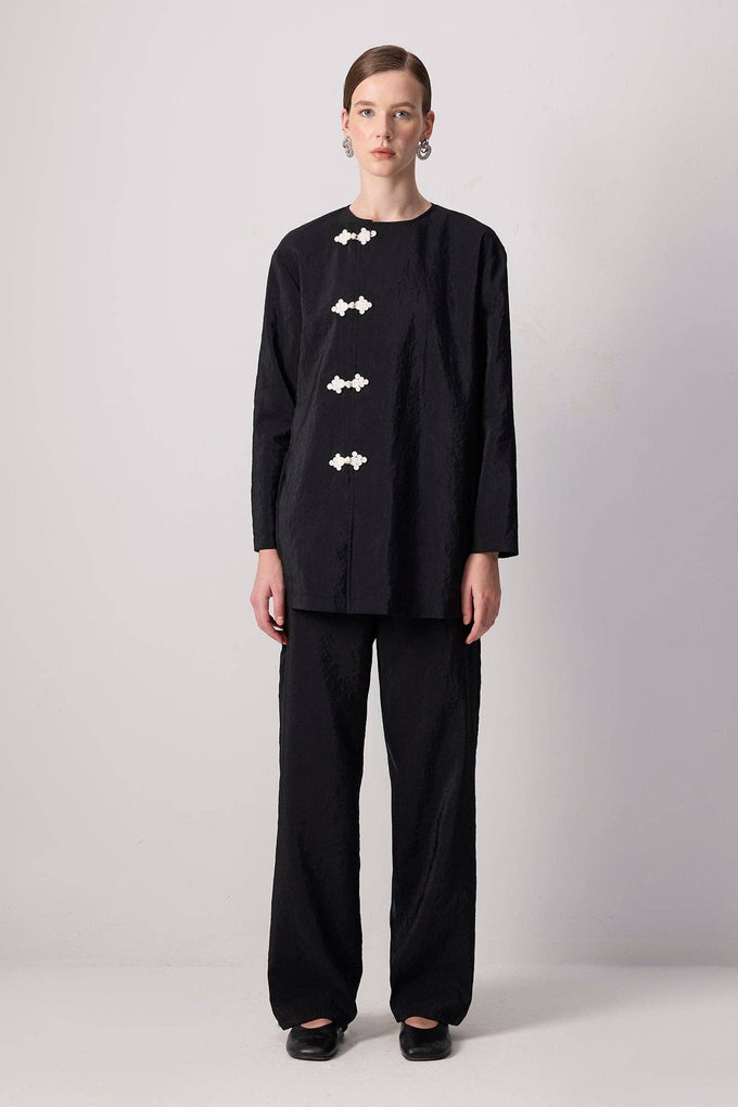 Set tunica e pantaloni in cupro