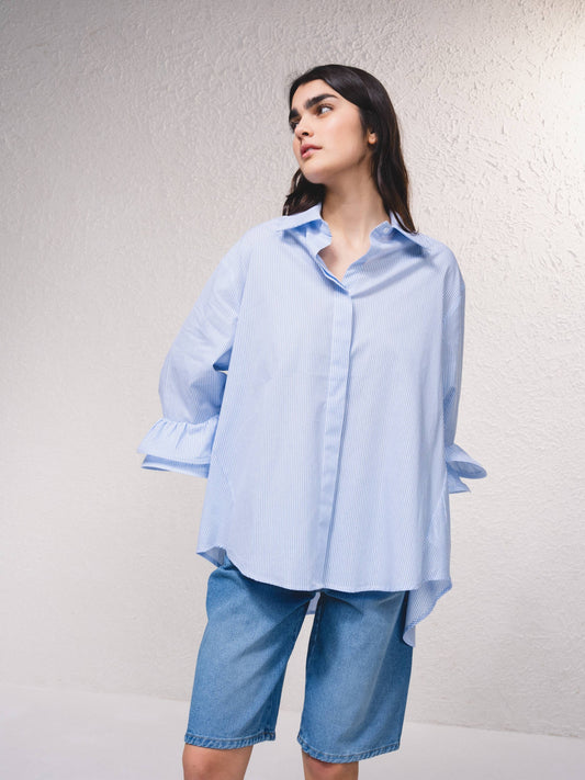 Blusa a righe con volant rinforzati