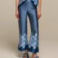 Pantaloni ampi in raso stampato blu