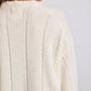 Maglione in lana d’agnello biologica a maniche lunghe con lavorazione drop needle