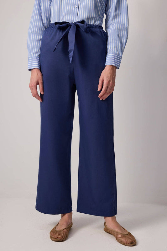 Pantaloni a gamba larga con cintura a fascia in misto cotone
