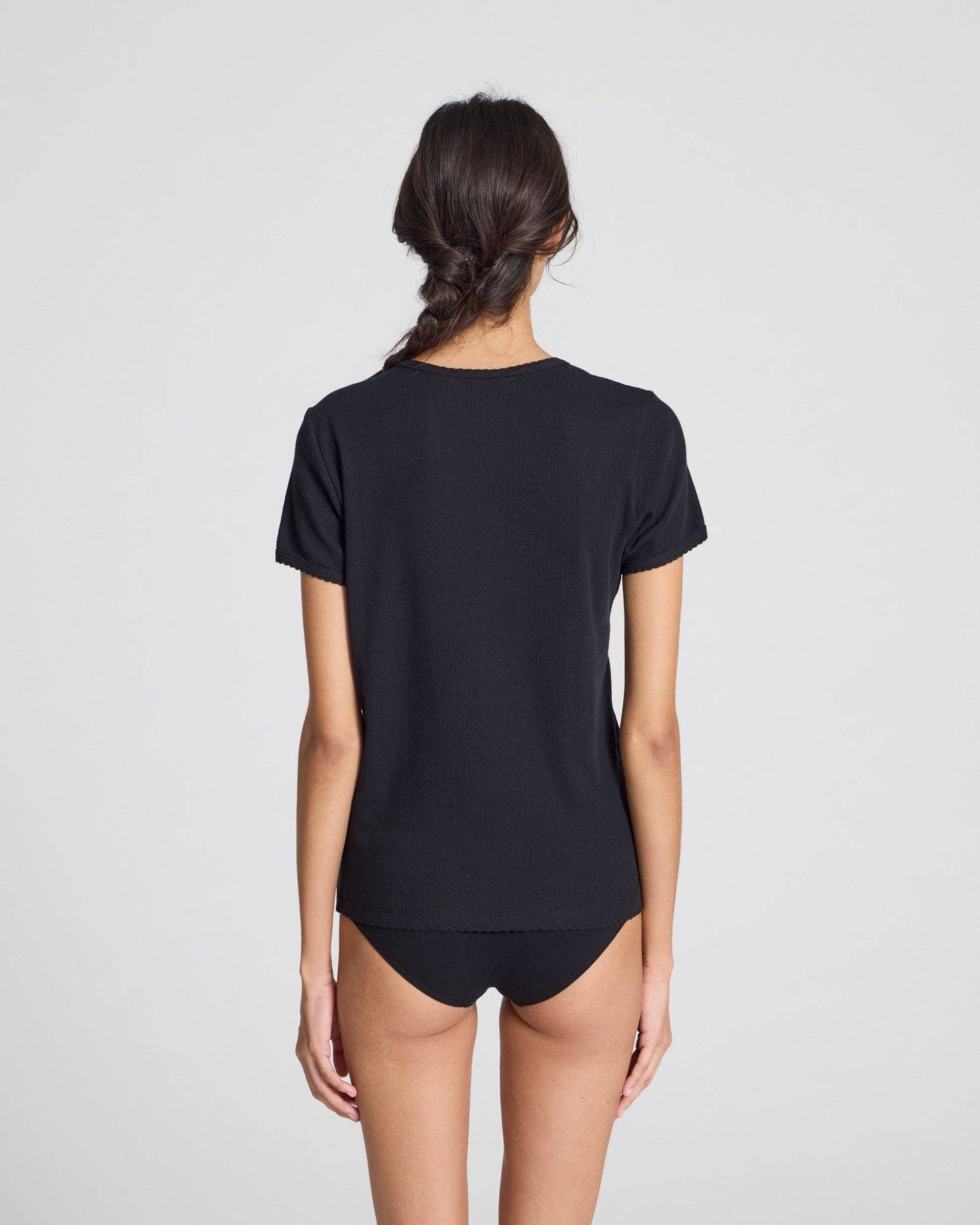 T-shirt Chrisstine in cotone biologico nero con dettagli in pizzo