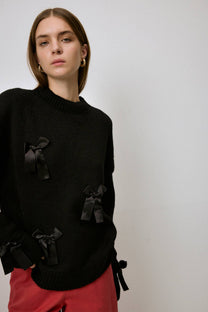 Maglione in maglia con fiocchi