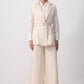 Completo elegante con gilet doppiopetto e pantaloni palazzo