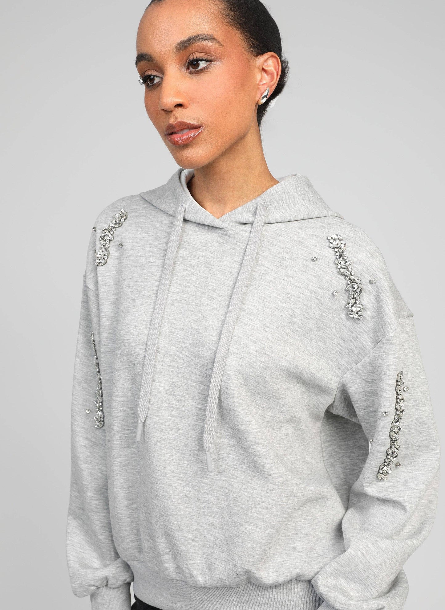 Felpa con cappuccio grigio mélange con strass