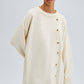 Maglione oversize con bottoni laterali