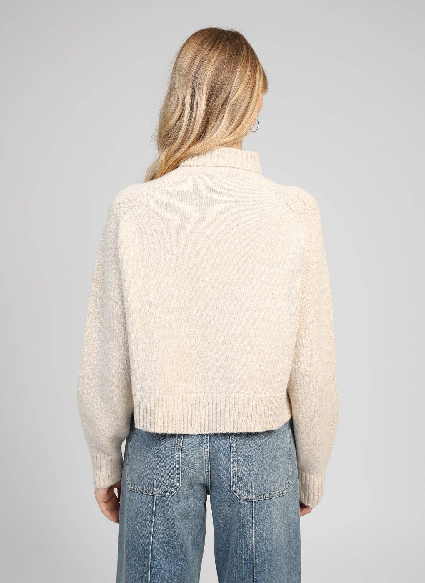 Maglione dolcevita in maglia calda color crema