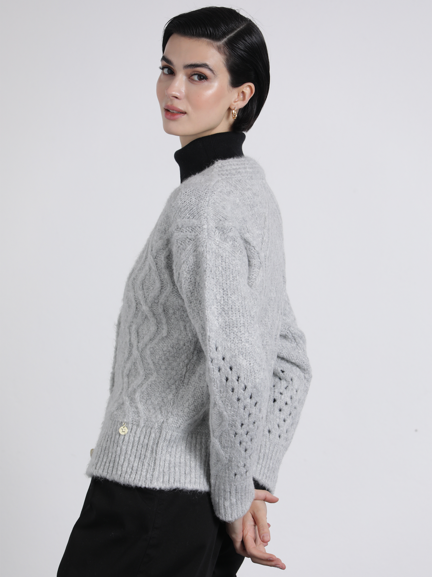 Cardigan in maglia traforata con bottoni