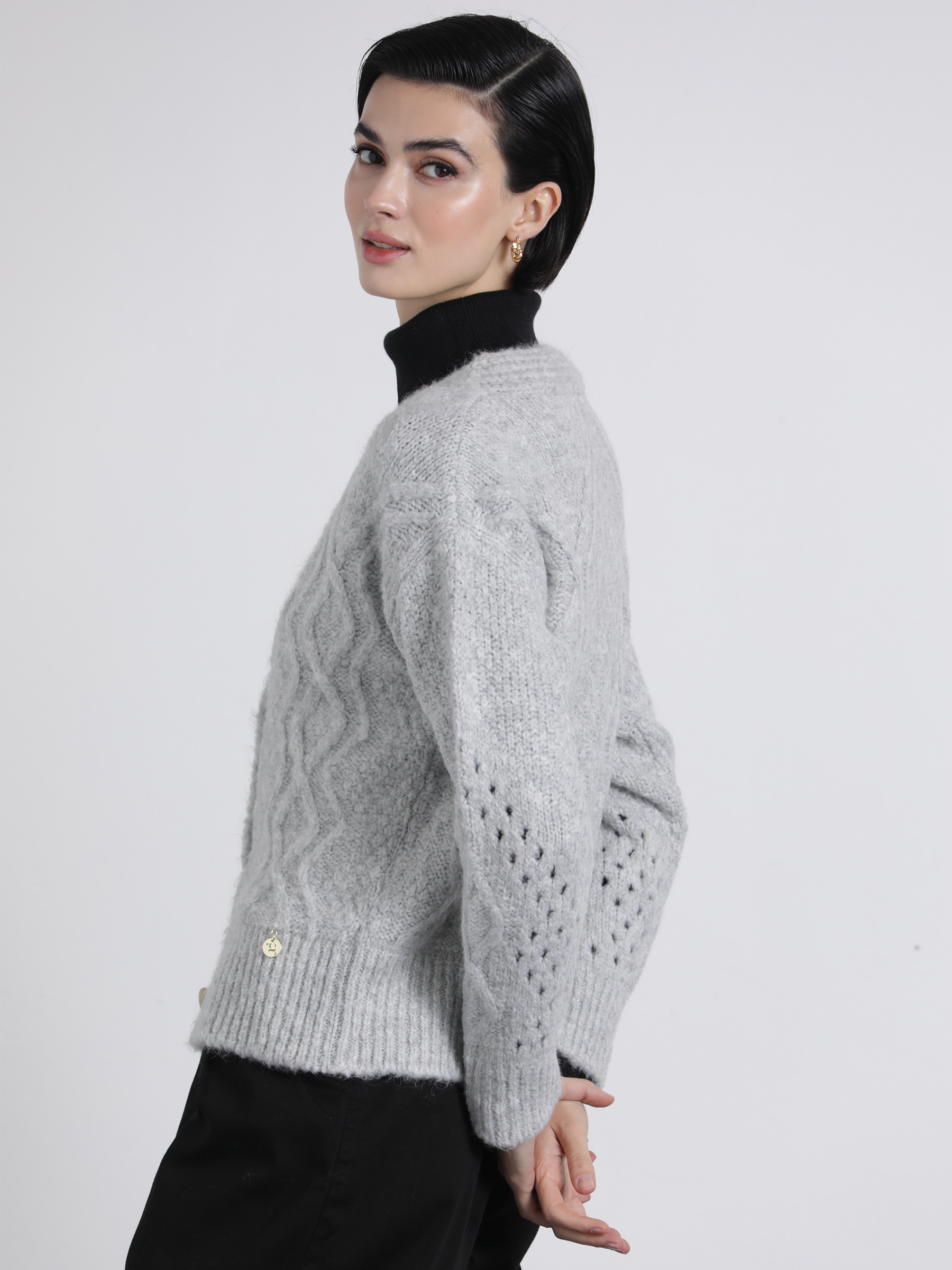 Cardigan in maglia traforata con bottoni