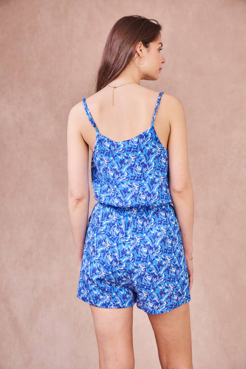 Tuta corta con stampa blu e scollo a V