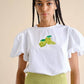 T-shirt bianca con paillettes a limone