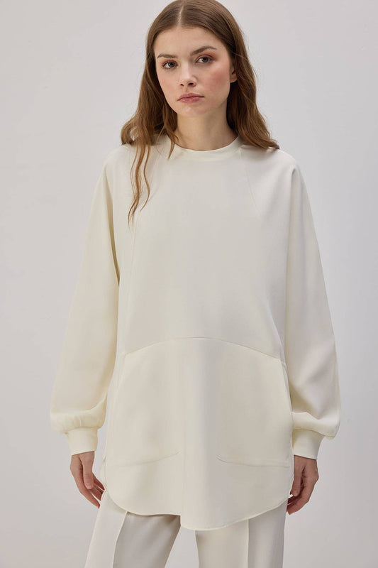 Tunica in crêpe con tasche