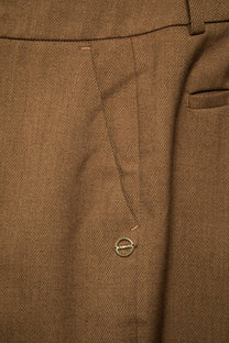 Pantaloni dritti eleganti con tasche oblique