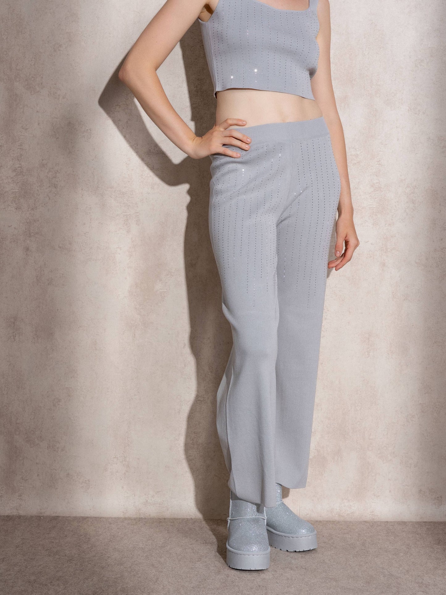 Pantaloni a vita alta in maglia con glitter