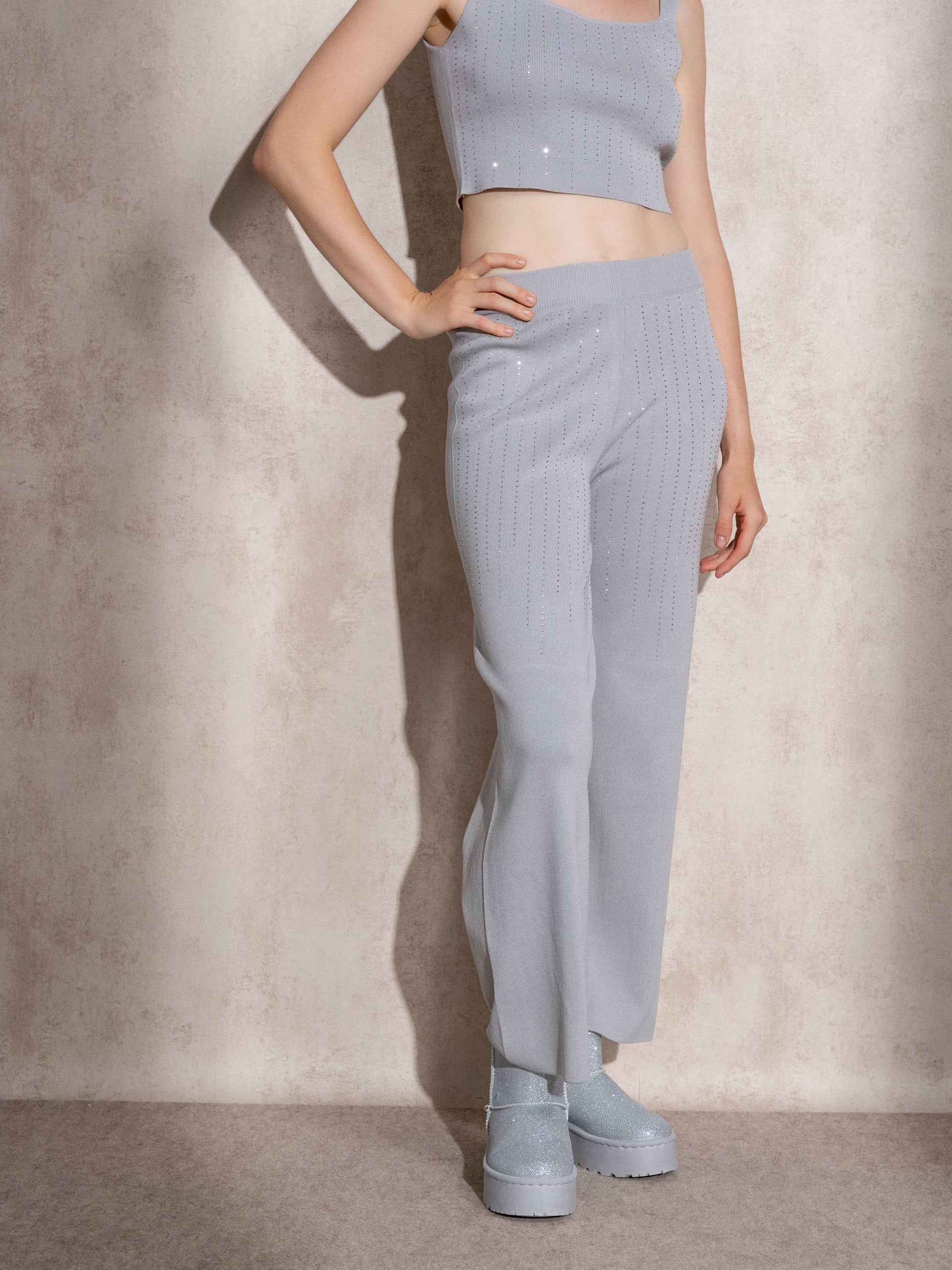 Pantaloni a vita alta in maglia con glitter