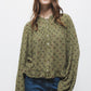 Blusa floreale con bottoni e maniche a palloncino