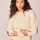 Maglione bianco in maglia con toppe a cuore e bottoni sul retro