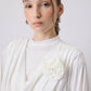 Camicetta drappeggiata con applicazione fiore