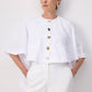 Camicia asimmetrica a mantella con bottoni decorativi