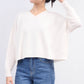 Maglione oversize con scollo a V in maglia morbida