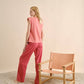 T-shirt con spalle strutturate e ricamo
