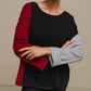 Maglia donna color block con bottoni ai polsi