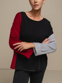 Maglia donna color block con bottoni ai polsi