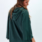 Mantella con cappuccio in maglia verde oliva