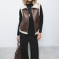 Gilet in pelliccia sintetica con colletto a fibbia