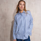 Blusa camicia oversize in cotone con bottoni dorati