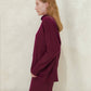 Maglione lungo dolcevita in misto cashmere con lavorazione 3D