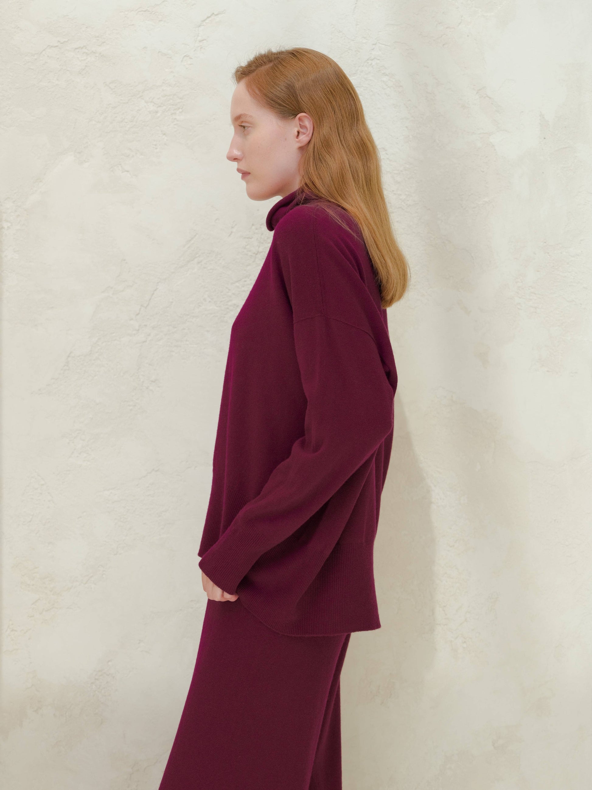 Maglione lungo dolcevita in misto cashmere con lavorazione 3D