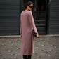 Abito midi in maglia morbida con tasche