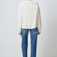 Cardigan in maglia crema con tasche e bottoni