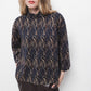 Blusa stampata con collo alto