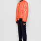 Bomber trapuntato a rombi arancione con zip