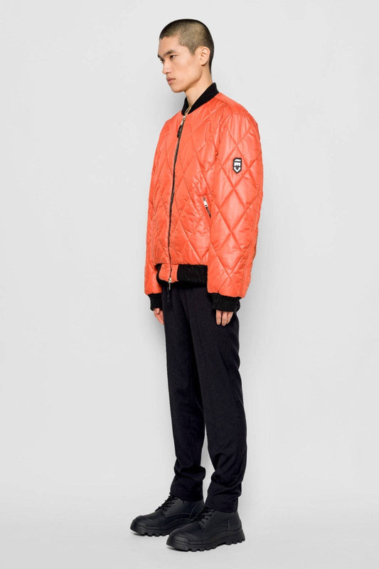 Bomber trapuntato a rombi arancione con zip