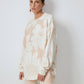 Maglione oversize beige con maxi fantasia floreale