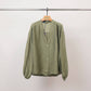 Blusa testurizzata con bottoni e scollo a V