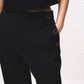 Pantaloni dritti con bottoni decorativi e vita elasticizzata