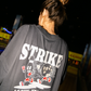 T-shirt oversize in cotone biologico con stampa Strike