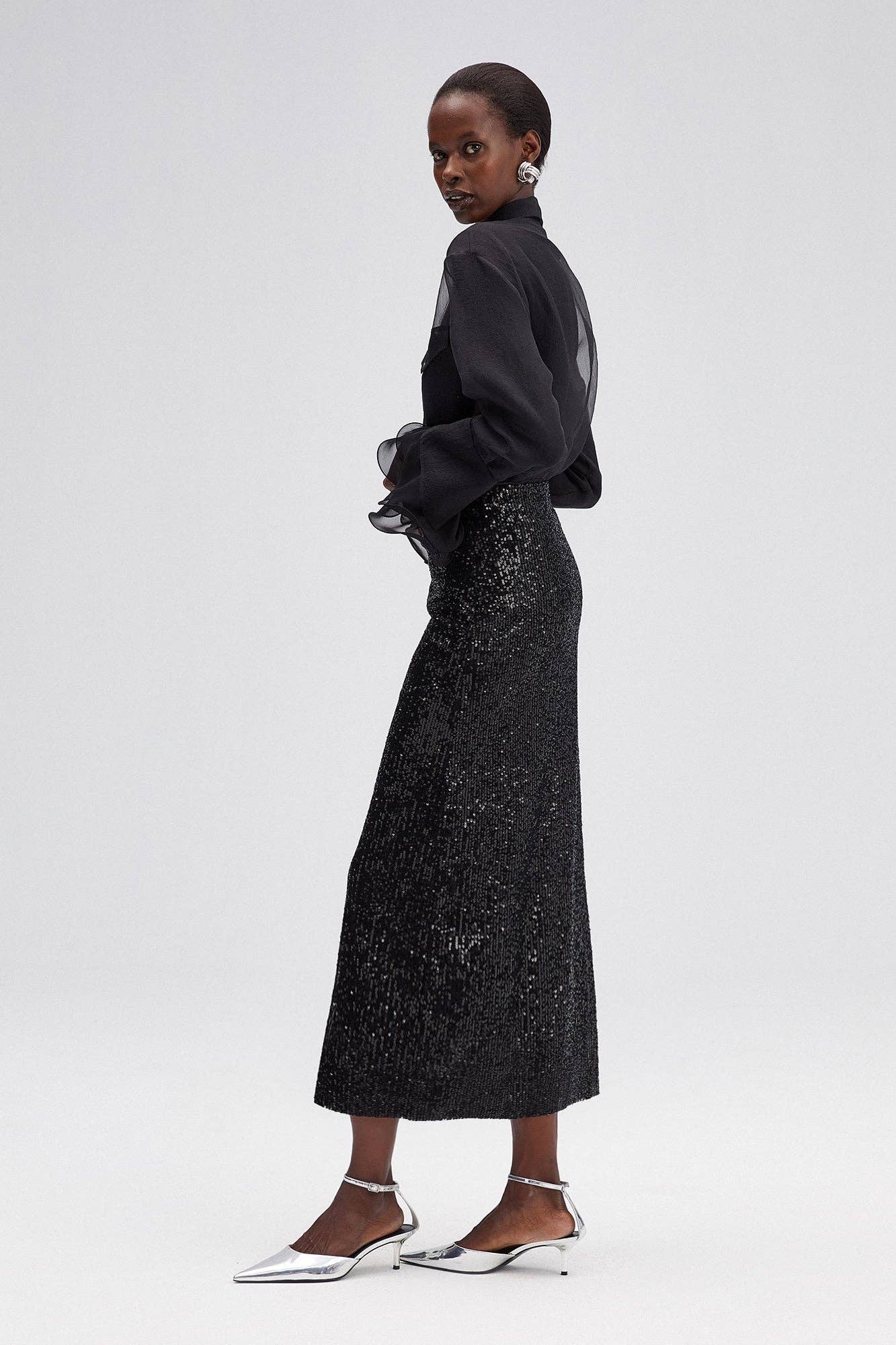 Gonna a tubino con paillettes nera