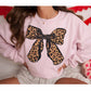 Felpa oversize con fiocco leopardato