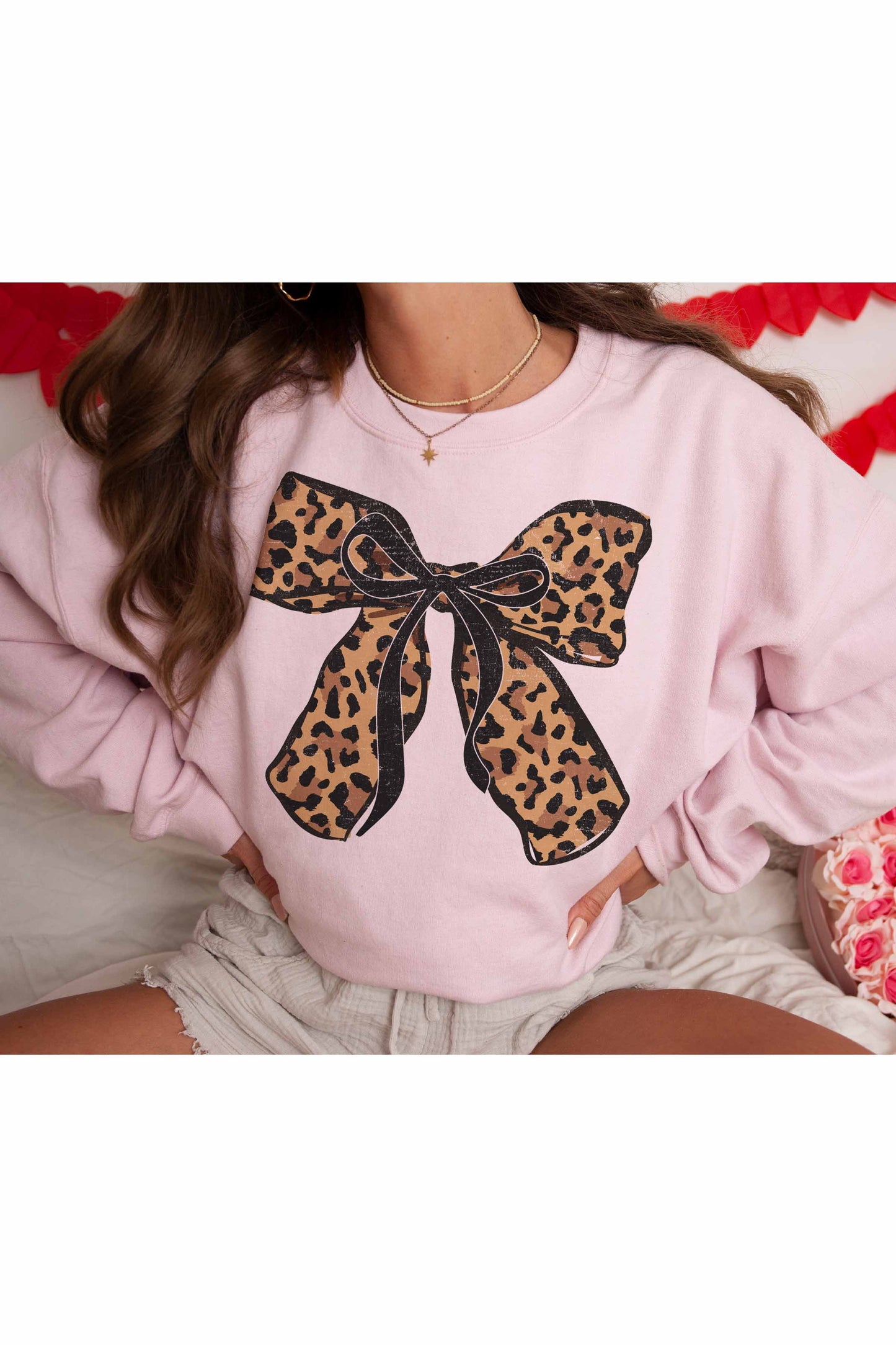 Felpa oversize con fiocco leopardato