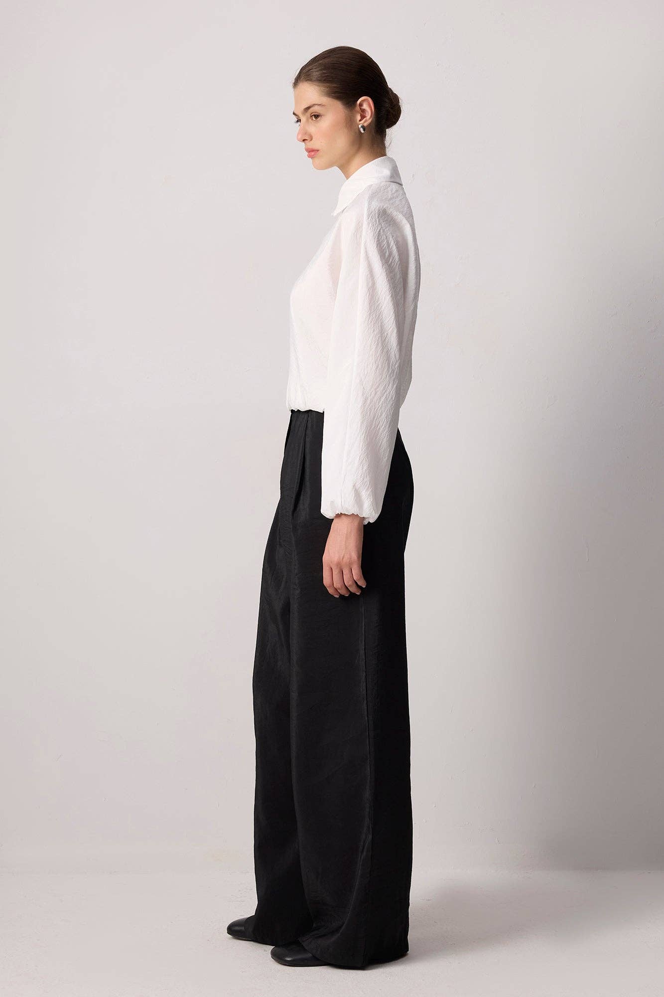Blusa con bottoni sul davanti e orlo elasticizzato