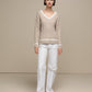 Maglione donna a trecce con scollo a V