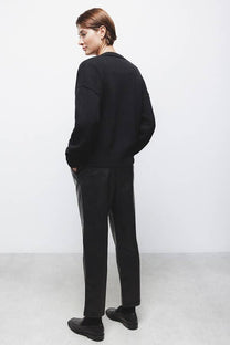 Pantaloni in finta pelle a vita elasticizzata