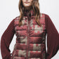 Gilet trapuntato con collo alto